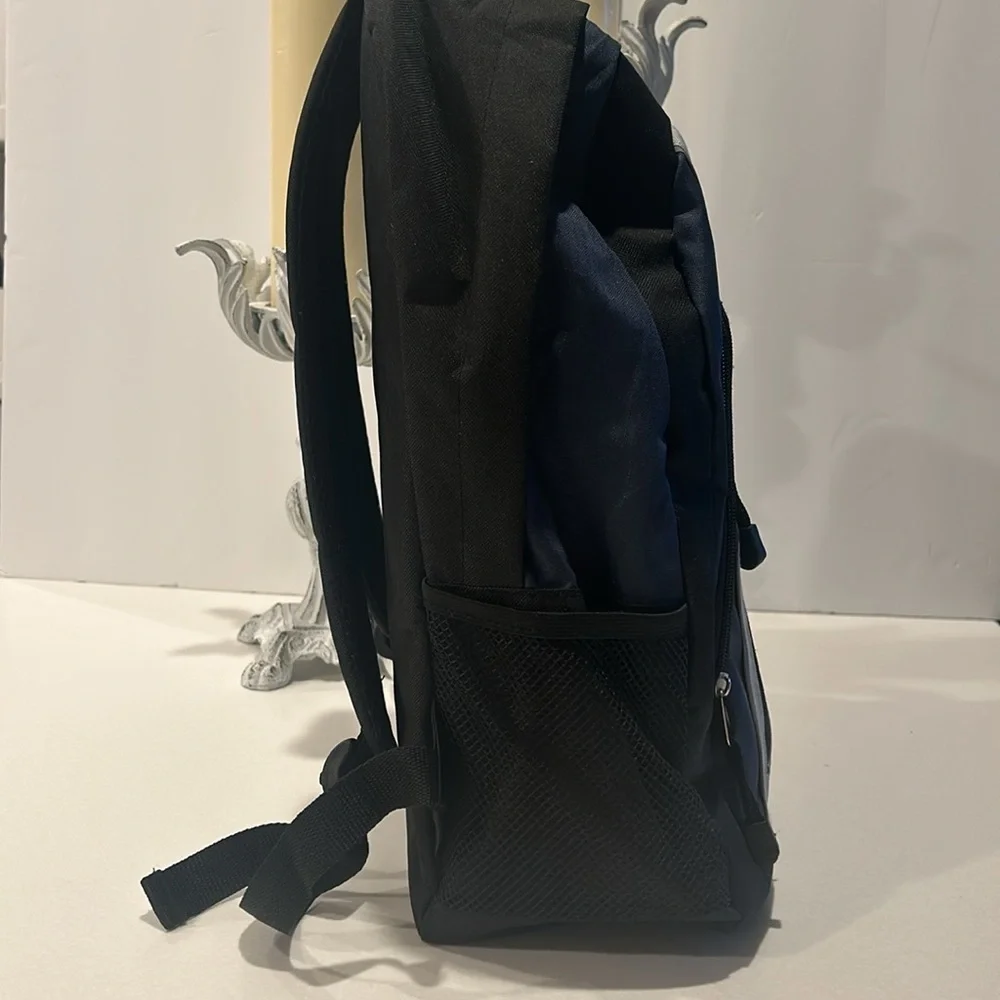 Aulani Disney resort and spa backpack. 3 zippered pockets and two netted sides. - Picture 4 of 9